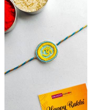 OM Rakhi- Handmade Beaded Sky-Blue Rakhi for Brother & Bhabhi