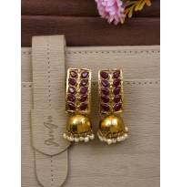 Gold-Plated Maroon Stone Leaf Jhumka Earrings 