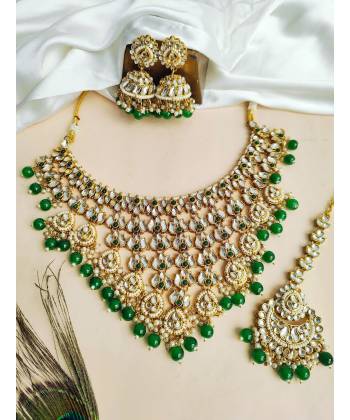 Glamorous Green Kundan Wedding Ensemble: Gold-Plated Lehenga Necklace Set