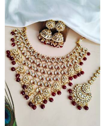 Maroon Elegance: Gold-plated Kundan Jewellery Set fit for Your Special Occasions